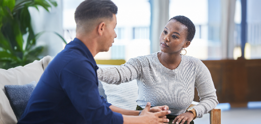 A psychologist having a conversation with her patient.